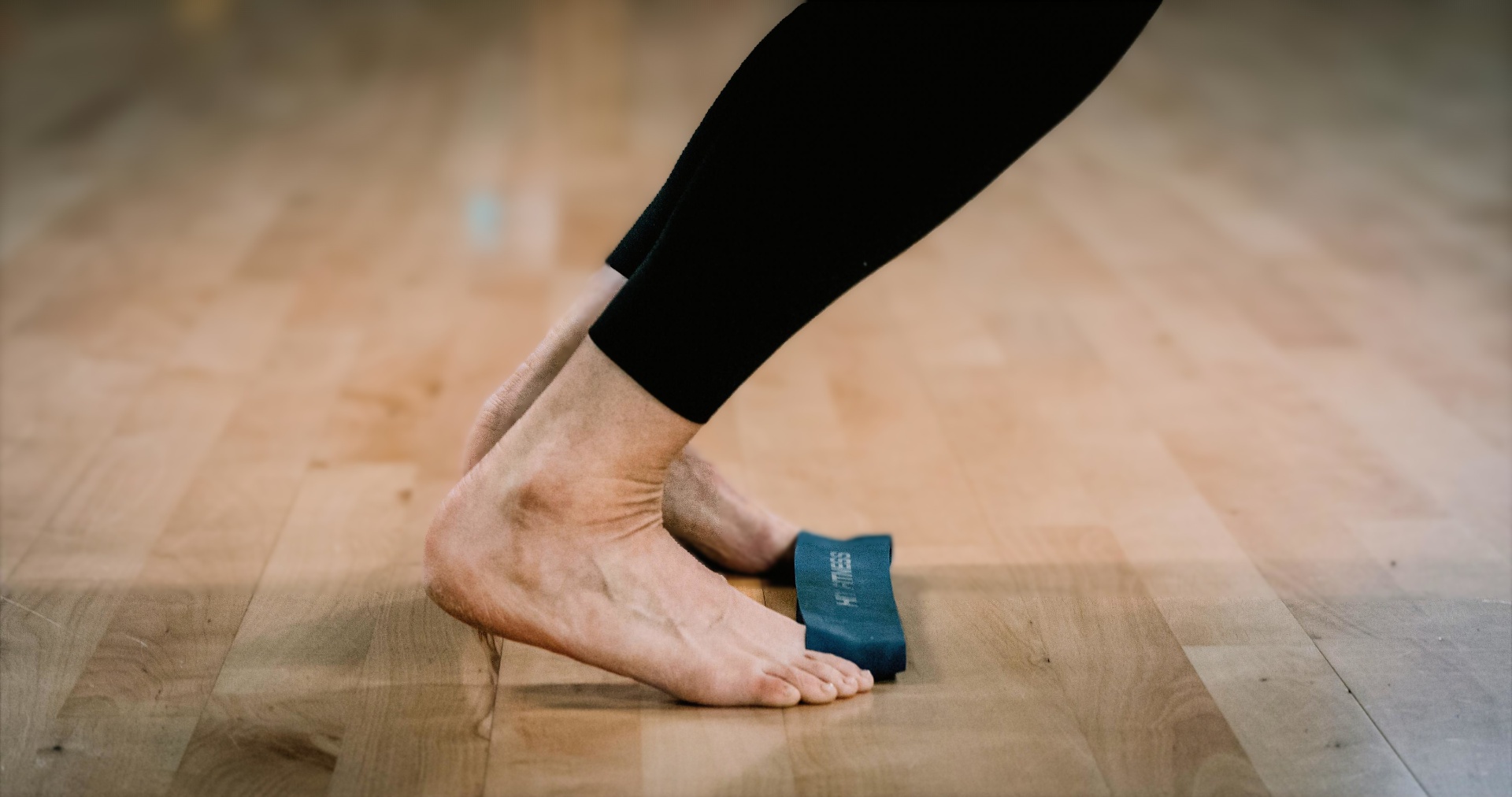 Close-up of foot and ankle strengthening with a resistance band