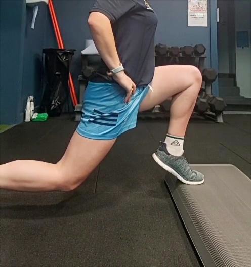 Athlete performing a controlled step lunge