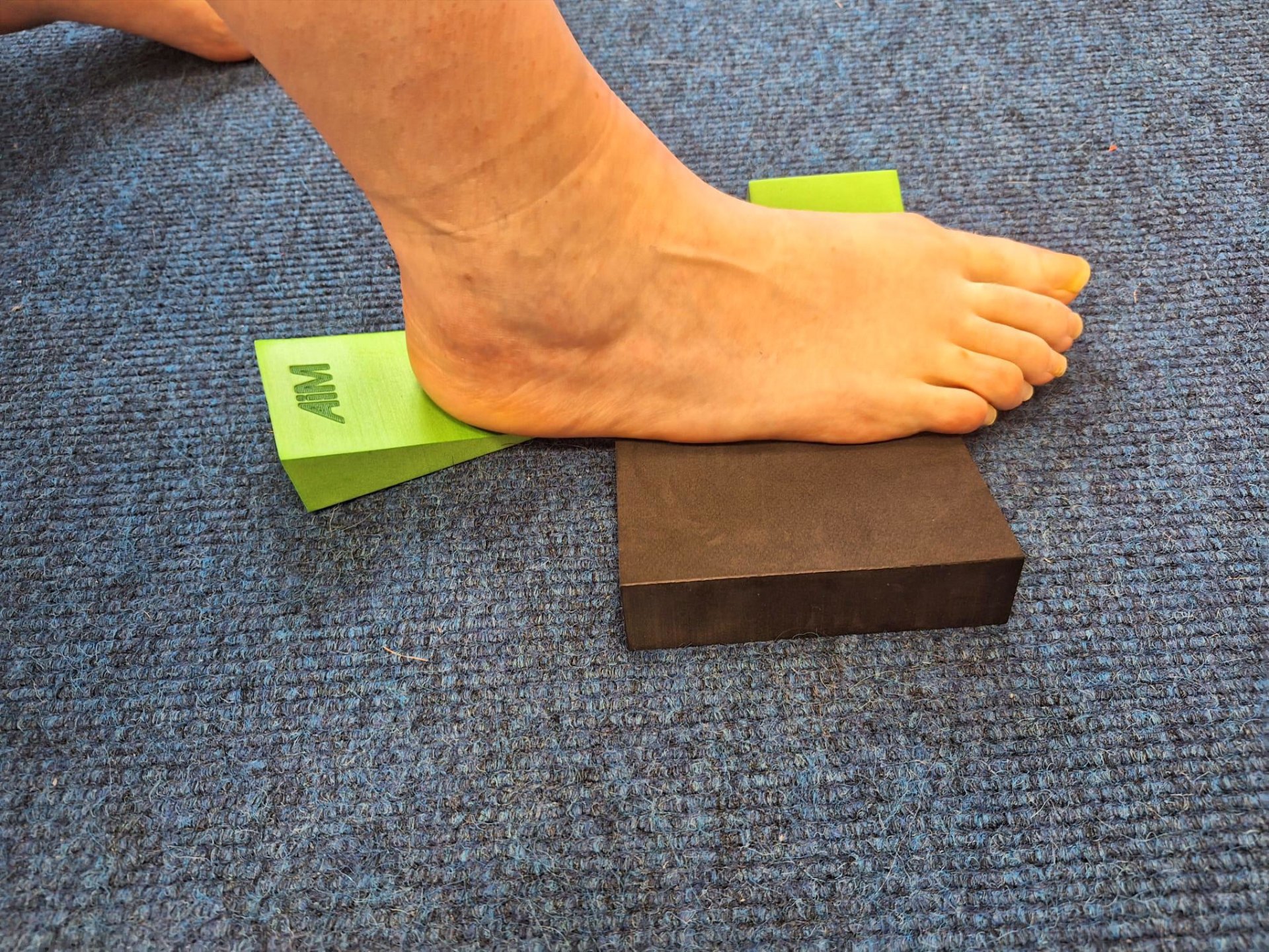 Close-up of supported foot and ankle mobility work