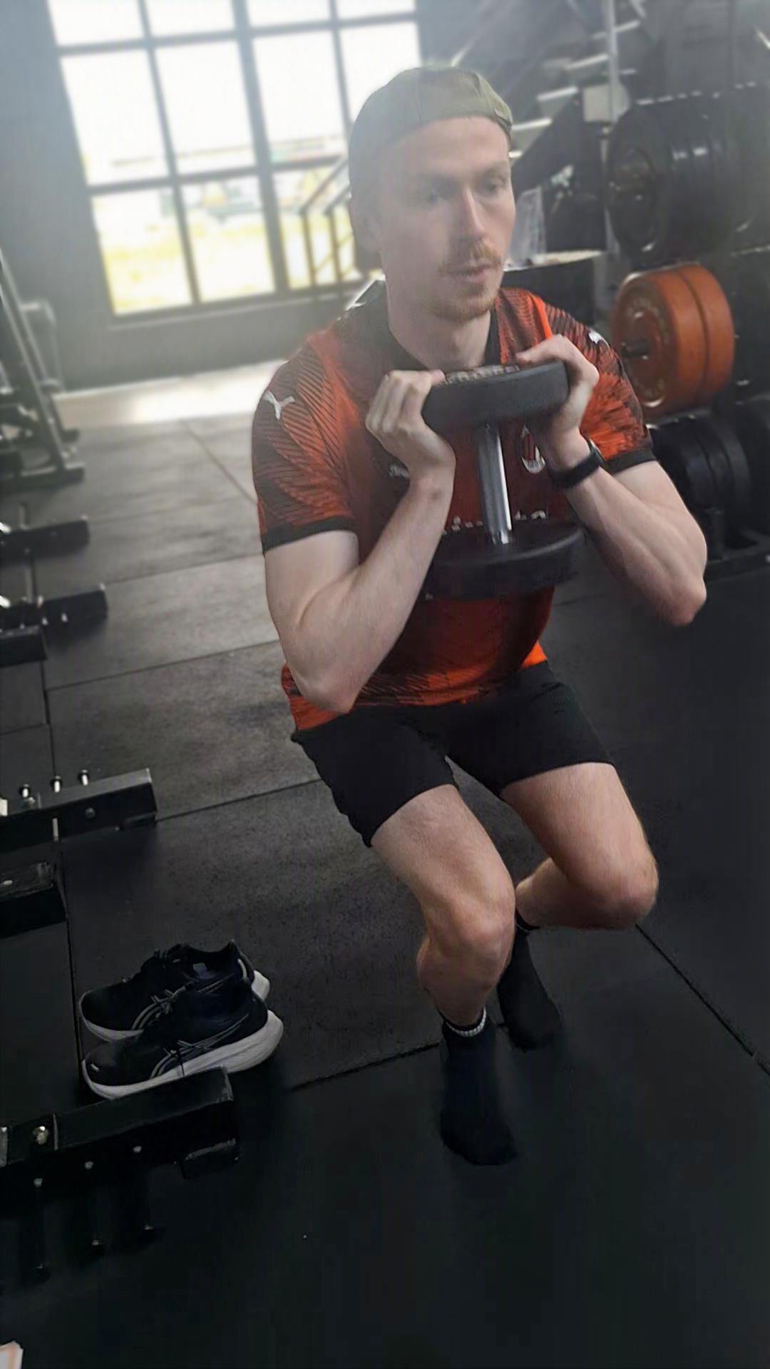 Athlete performing a controlled goblet squat