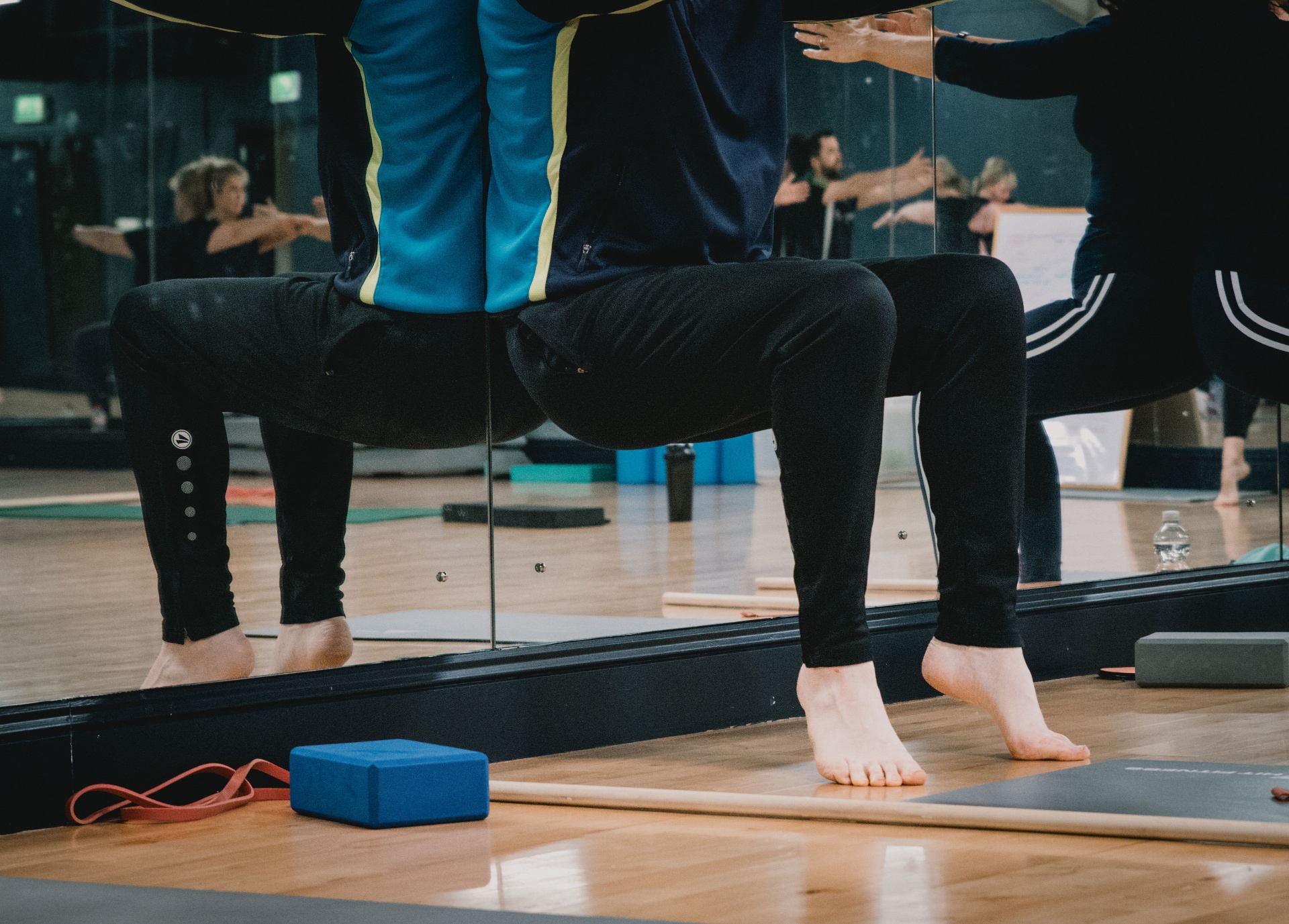 Close-up of squat stance and foot position during a class